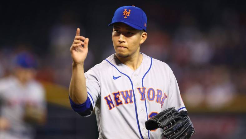 Jul 5, 2023; Phoenix, Arizona, USA; New York Mets pitcher Kodai Senga reacts after the final out in the first inning against the Arizona Diamondbacks at Chase Field. Mandatory Credit: Mark J. Rebilas-USA TODAY Sports