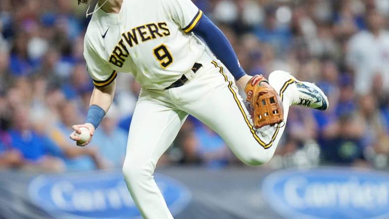 Milwaukee Brewers third basemen Brian Anderson (9) catches the ground ball from Chicago Cubs center fielder Cody Bellinger (24) during the second inning on Wednesday July 5, 2023 at American Family Field in Milwaukee, Wis.