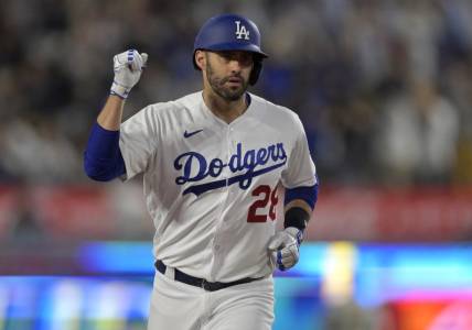 Jul 5, 2023; Los Angeles, California, USA; Los Angeles Dodgers designated hitter J.D. Martinez (28) pumps his fist as he rounds the bases after hitting a three-run home run in the fifth inning against the Pittsburgh Pirates at Dodger Stadium. Mandatory Credit: Jayne Kamin-Oncea-USA TODAY Sports