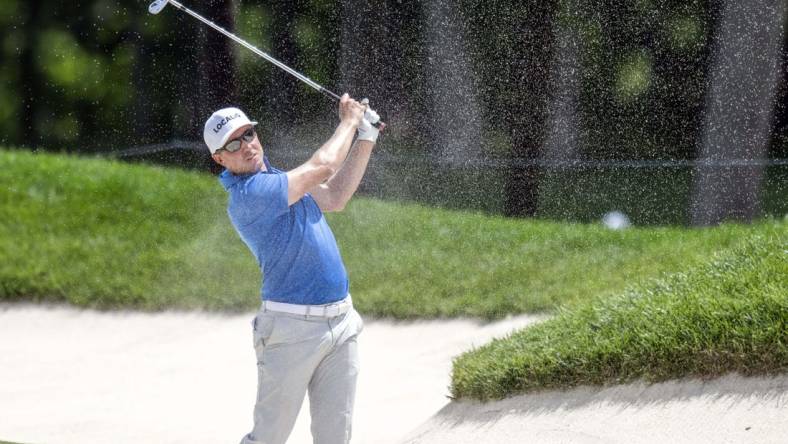 Jul 6, 2023; Silvis, Illinois, USA;  Jonas Blixt hits a shot out of a fairway bunker on the 18th hole during the first round of the John Deere Classic golf tournament. Mandatory Credit: Marc Lebryk-USA TODAY Sports