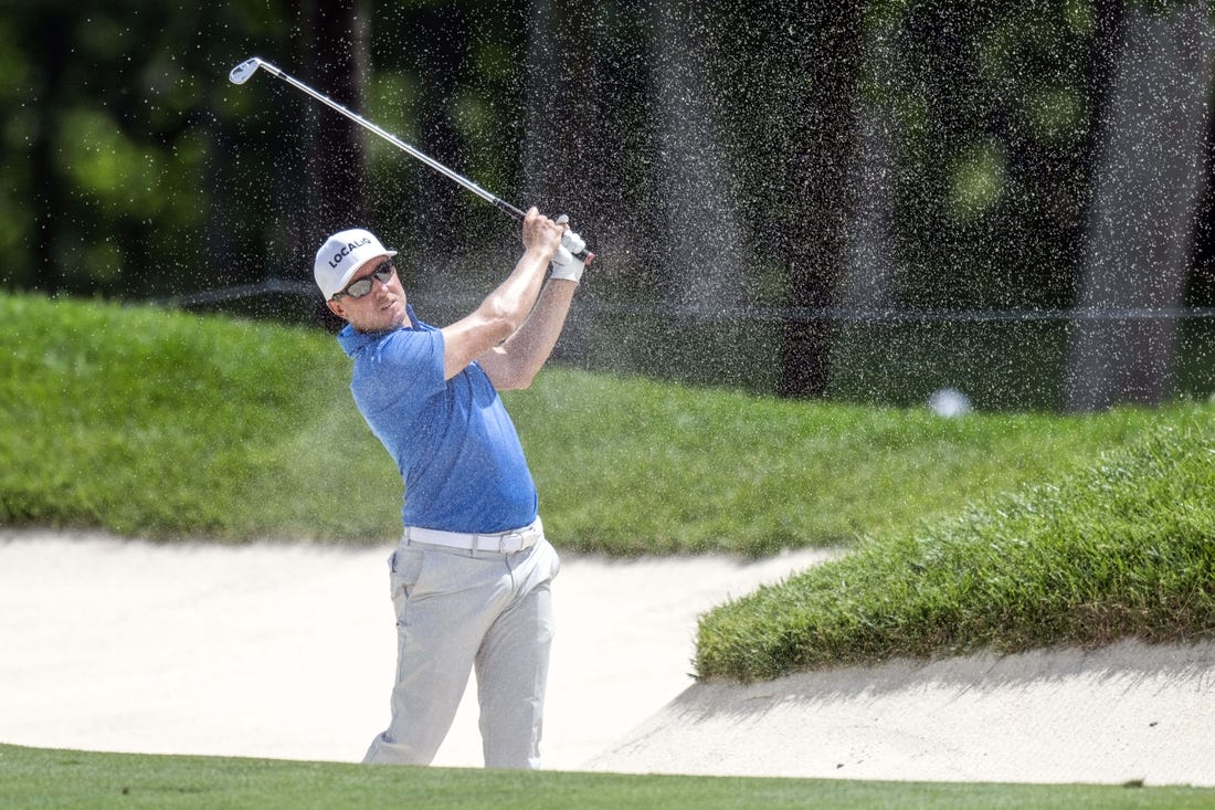 Jul 6, 2023; Silvis, Illinois, USA;  Jonas Blixt hits a shot out of a fairway bunker on the 18th hole during the first round of the John Deere Classic golf tournament. Mandatory Credit: Marc Lebryk-USA TODAY Sports