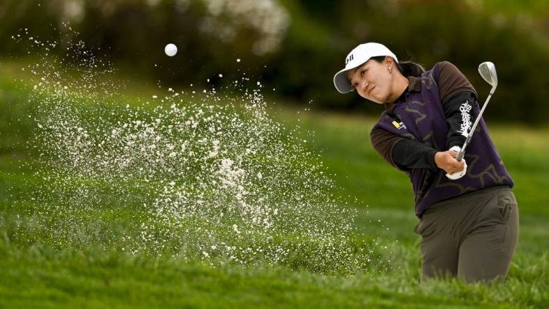 Jul 6, 2023; Pebble Beach, California, USA; Annie Park hits out of the bunker on the 14th hole during the first round of the U.S. Women's Open golf tournament at Pebble Beach Golf Links. Mandatory Credit: Kelvin Kuo-USA TODAY Sports