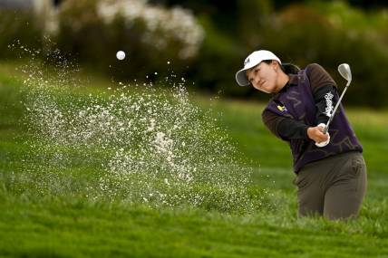 Jul 6, 2023; Pebble Beach, California, USA; Annie Park hits out of the bunker on the 14th hole during the first round of the U.S. Women's Open golf tournament at Pebble Beach Golf Links. Mandatory Credit: Kelvin Kuo-USA TODAY Sports