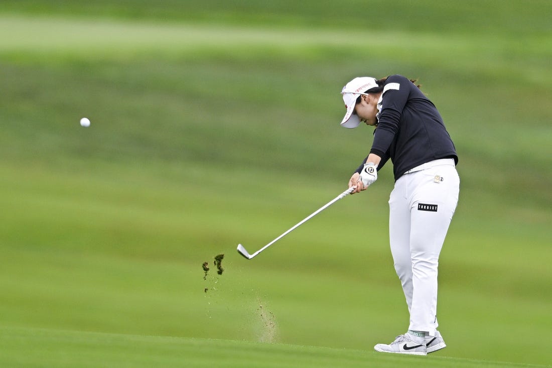 Jul 6, 2023; Pebble Beach, California, USA; Xiyu Janet Lin hits an approach shot on the 13th hole during the first round of the U.S. Women's Open golf tournament at Pebble Beach Golf Links. Mandatory Credit: Kelvin Kuo-USA TODAY Sports