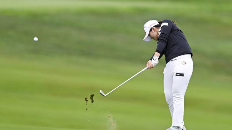 Jul 6, 2023; Pebble Beach, California, USA; Xiyu Janet Lin hits an approach shot on the 13th hole during the first round of the U.S. Women's Open golf tournament at Pebble Beach Golf Links. Mandatory Credit: Kelvin Kuo-USA TODAY Sports