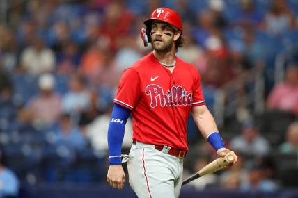 Jul 6, 2023; St. Petersburg, Florida, USA;  Philadelphia Phillies designated hitter Bryce Harper (3) looks on after striking out against the Tampa Bay Rays in the first inning at Tropicana Field. Mandatory Credit: Nathan Ray Seebeck-USA TODAY Sports