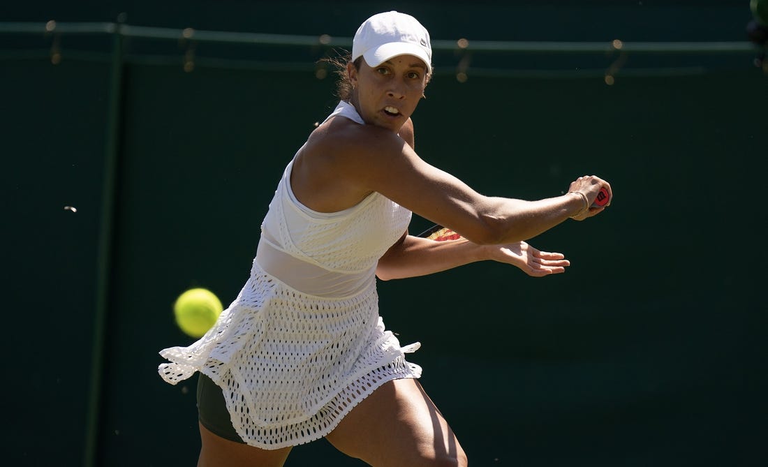 Jul 7, 2023; London, United Kingdom; Madison Keys (USA) returns a shot during her match against Viktorija Golubic (SUI) on day five at the All England Lawn Tennis and Croquet Club.  Mandatory Credit: Susan Mullane-USA TODAY Sports