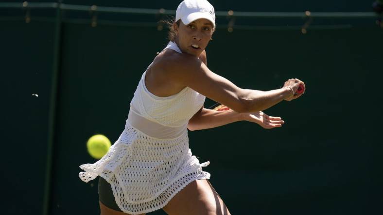 Jul 7, 2023; London, United Kingdom; Madison Keys (USA) returns a shot during her match against Viktorija Golubic (SUI) on day five at the All England Lawn Tennis and Croquet Club.  Mandatory Credit: Susan Mullane-USA TODAY Sports