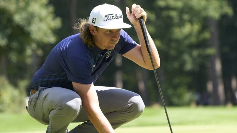 Jul 7, 2023; Hertfordshire, ENG;     Cameron Smith (AUS) on the third green during the first round of the LIV Golf London golf tournament at Centurion Club. Mandatory Credit: Peter van den Berg-USA TODAY Sports