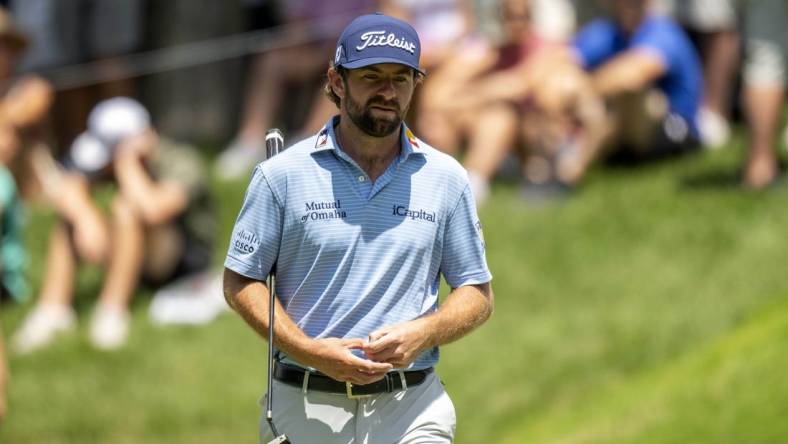 Jul 7, 2023; Silvis, Illinois, USA; Cameron Young walks onto the 9th green during the second round of the John Deere Classic golf tournament. Mandatory Credit: Marc Lebryk-USA TODAY Sports