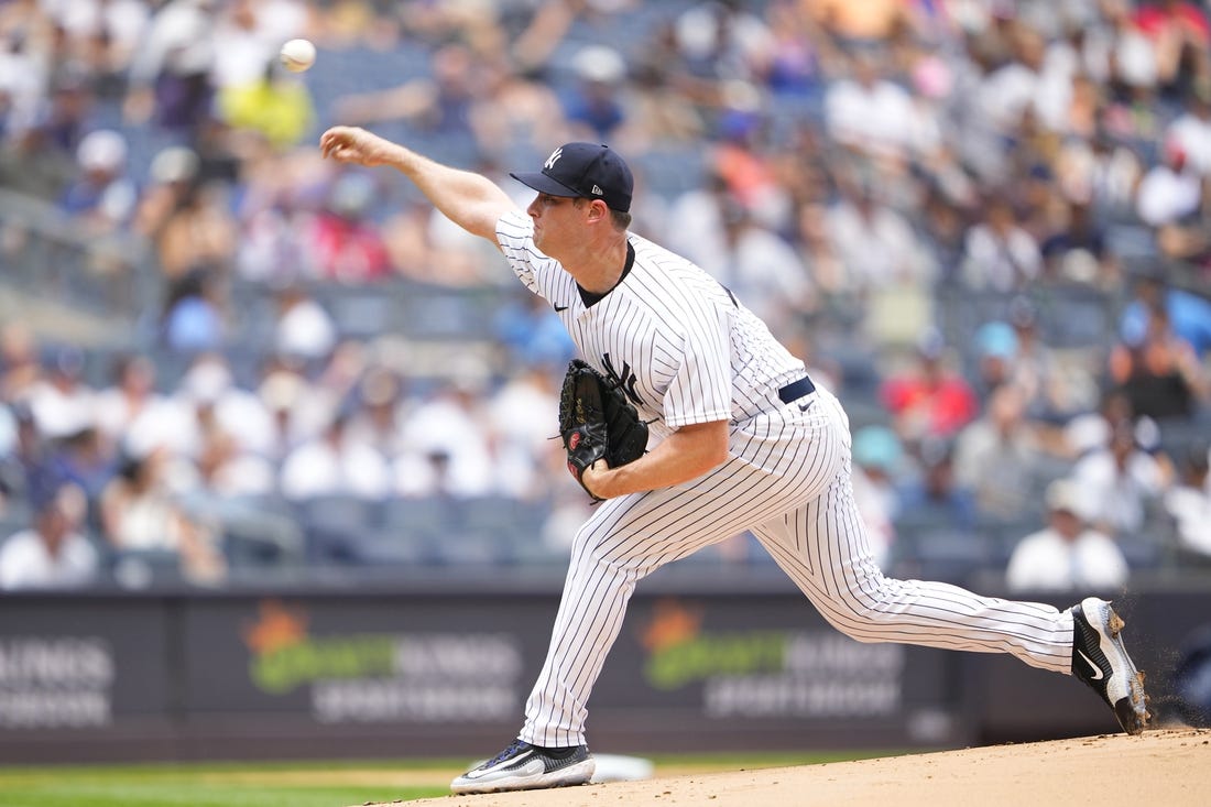 Yankees' late homers, Gerrit Cole clinch series victory over Royals