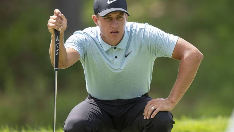 Jul 8, 2023; Silvis, Illinois, USA; Cameron Champ lines up a putt on the 9th hole during the third round of the John Deere Classic golf tournament. Mandatory Credit: Marc Lebryk-USA TODAY Sports