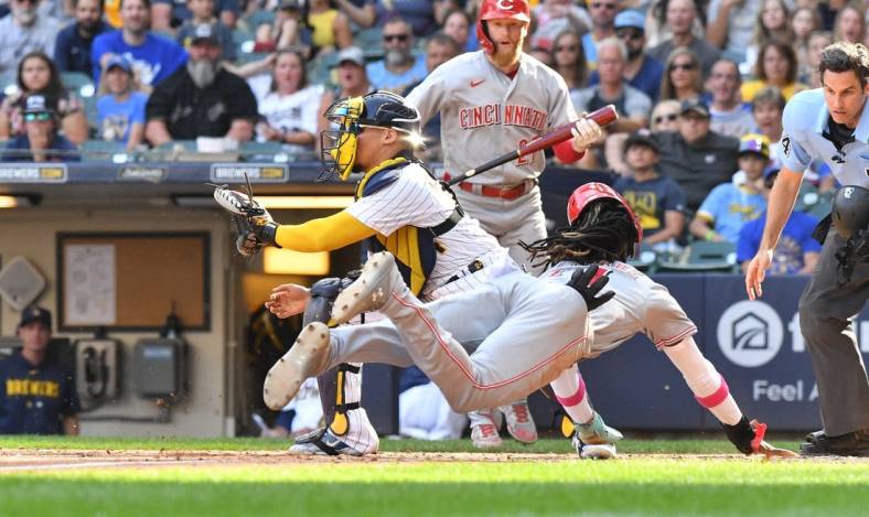 Brewers Craig Counsell holds hand up as Elly De La Cruz's memorable  performance gives Reds vital win in Milwaukee