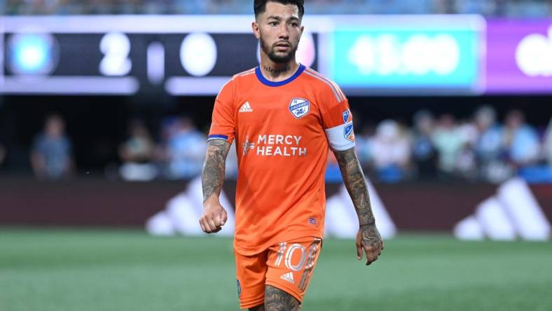 Jul 8, 2023; Charlotte, North Carolina, USA; FC Cincinnati midfielder Luciano Acosta (10) looks down the field in the first half against Charlotte FC at Bank of America Stadium. Mandatory Credit: Griffin Zetterberg-USA TODAY Sportsfc