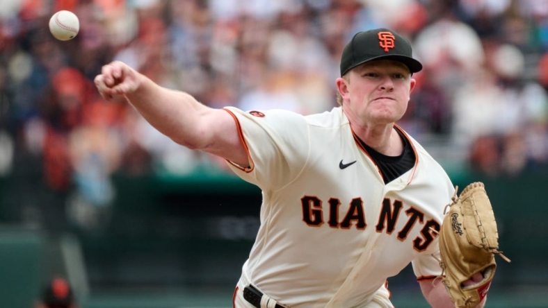 Jul 9, 2023; San Francisco, California, USA; San Francisco Giants pitcher Logan Webb (62) throws a pitch against the Colorado Rockies during the first inning at Oracle Park. Mandatory Credit: Robert Edwards-USA TODAY Sports