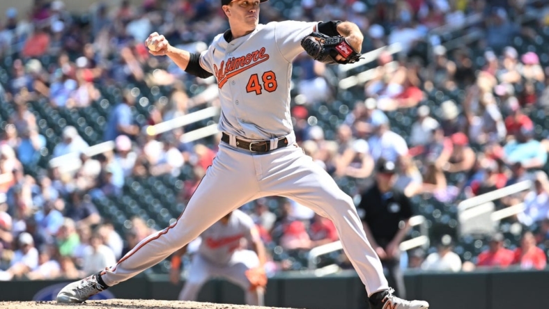 Jul 9, 2023; Minneapolis, Minnesota, USA; Baltimore Orioles starting pitcher Kyle Gibson (48) throws a pitch against the Minnesota Twins during the sixth inning at Target Field. Mandatory Credit: Jeffrey Becker-USA TODAY Sports