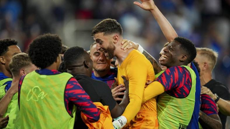 Jul 9, 2023; Cincinnati, Ohio, USA;  United States goalkeeper Matt Turner, middle, celebrates with teammates after defeating Canada in penalty kicks at TQL Stadium. Mandatory Credit: Aaron Doster-USA TODAY Sports