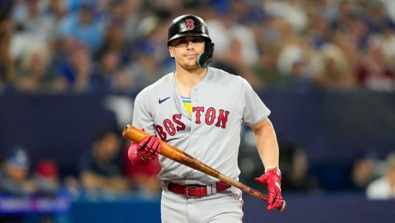 Jul 2, 2023; Toronto, Ontario, CAN; Boston Red Sox shortstop Enrique Hernandez (5) reacts to a striking out against the Toronto Blue Jays at Rogers Centre. Mandatory Credit: Kevin Sousa-USA TODAY Sports