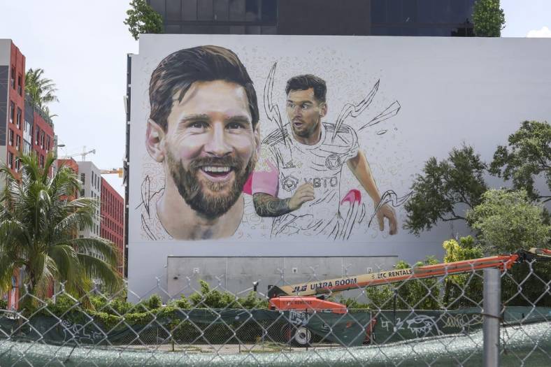 Jul 11, 2023; Miami, FL, USA; A mural of Argentine soccer player Lionel Messi by artist Maxi Bagnasco is seen in the Miami neighborhood of Wynwood as Messi is set to be presented as an Inter Miami CF player later this week Mandatory Credit: Sam Navarro-USA TODAY Sports