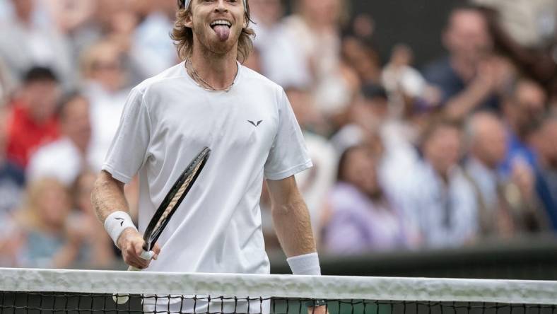 Jul 11, 2023; London, United Kingdom; Andrey Rublev reacts to a point during his match against Novak Djokovic (SRB) on day nine at the All England Lawn Tennis and Croquet Club. Mandatory Credit: Susan Mullane-USA TODAY Sports