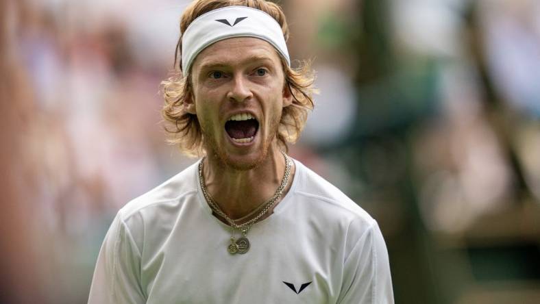 Jul 11, 2023; London, United Kingdom; Andrey Rublev reacts to a point during his match against Novak Djokovic (SRB) on day nine at the All England Lawn Tennis and Croquet Club. Mandatory Credit: Susan Mullane-USA TODAY Sports