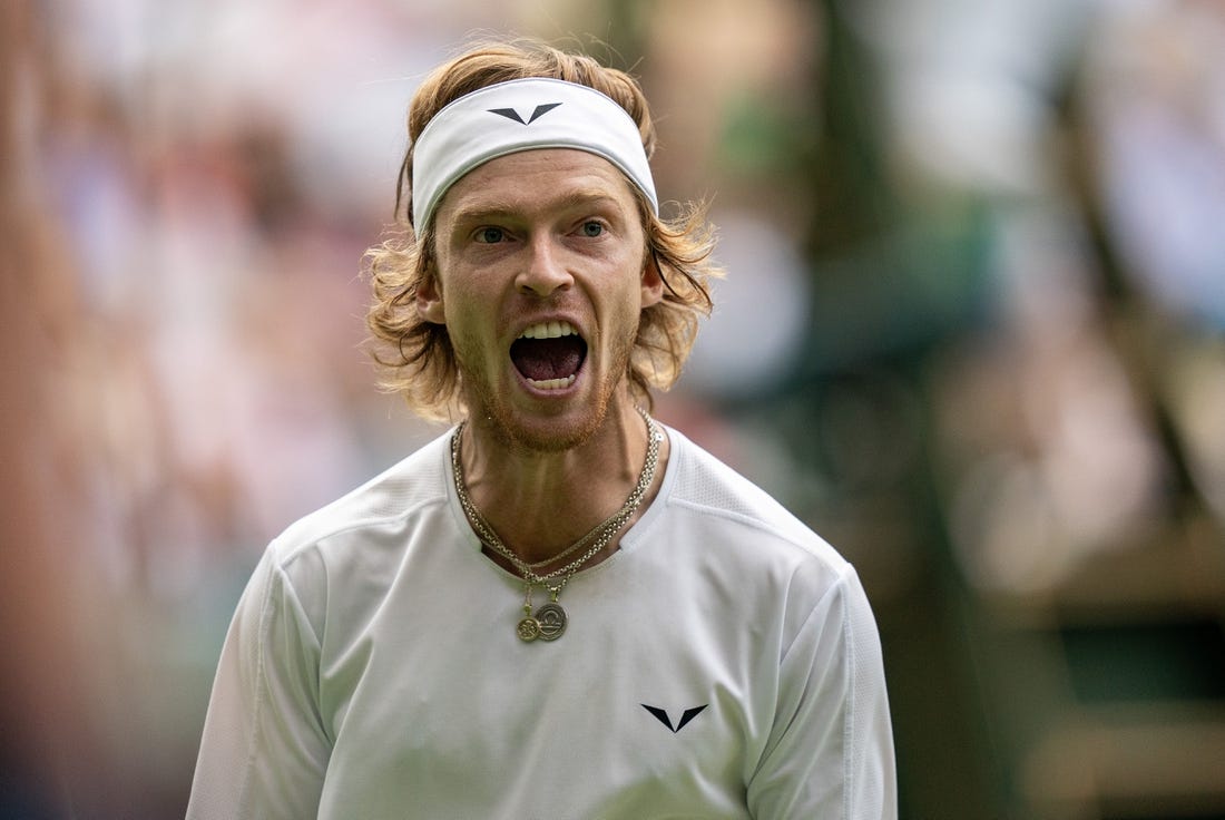 Jul 11, 2023; London, United Kingdom; Andrey Rublev reacts to a point during his match against Novak Djokovic (SRB) on day nine at the All England Lawn Tennis and Croquet Club. Mandatory Credit: Susan Mullane-USA TODAY Sports