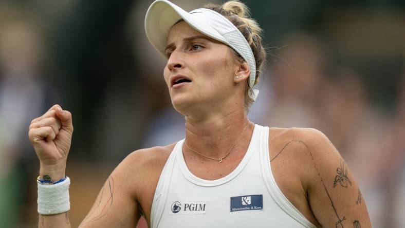 Jul 11, 2023; London, United Kingdom; Marketa Vondrousova (CZE) reacts to a point during her match against Jessica Pegula (USA) on day nine of Wimbledon at the All England Lawn Tennis and Croquet Club.  Mandatory Credit: Susan Mullane-USA TODAY Sports