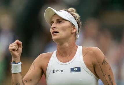 Jul 11, 2023; London, United Kingdom; Marketa Vondrousova (CZE) reacts to a point during her match against Jessica Pegula (USA) on day nine of Wimbledon at the All England Lawn Tennis and Croquet Club.  Mandatory Credit: Susan Mullane-USA TODAY Sports