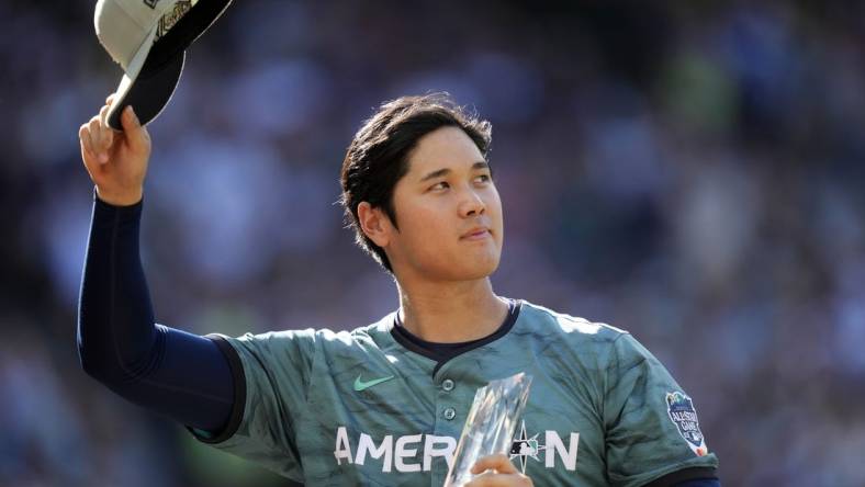 Jul 11, 2023; Seattle, Washington, USA; American League designated hitter/pitcher  Shohei Ohtani  of the Los Angeles Angels of Anaheim (17) reacts during the second inning at T-Mobile Park. Mandatory Credit: Stephen Brashear-USA TODAY Sports