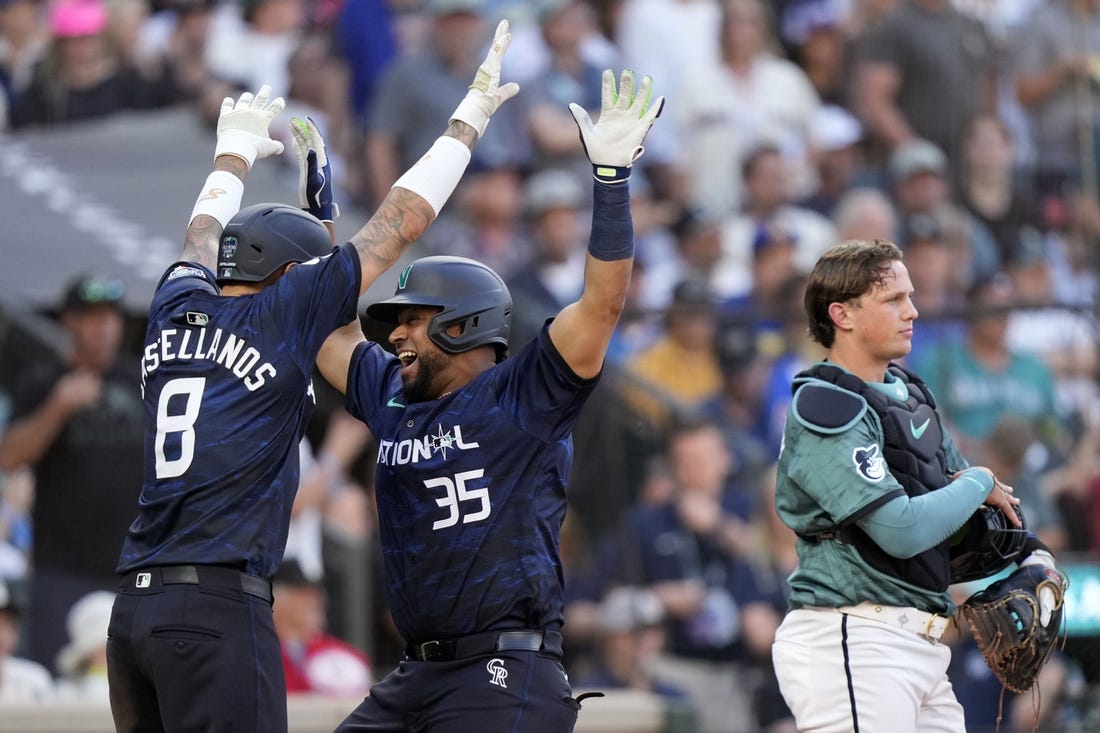 Jul 11, 2023; Seattle, Washington, USA; National League catcher  Elias Diaz  of the Colorado Rockies (35) reacts after hitting a two run home run against the American League during the eighth inning at T-Mobile Park. Mandatory Credit: Stephen Brashear-USA TODAY Sports