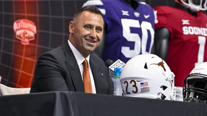 Jul 12, 2023; Arlington, TX, USA; Texas Longhorns head coach Steve Sarkisian is interviewed during Big 12 football media day at AT&T Stadium. Mandatory Credit: Jerome Miron-USA TODAY Sports