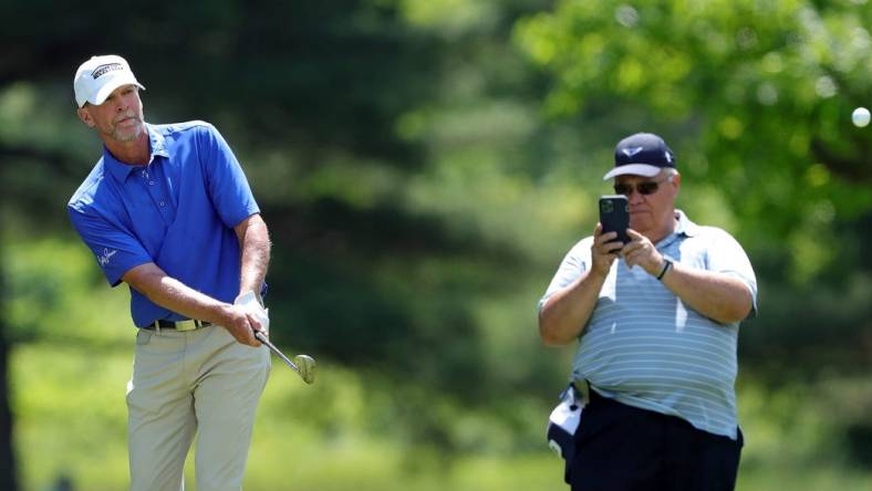 Steve Stricker watches his shot to the No. 4 pin during the second round of the 2023 Kaulig Companies Championship at Firestone Country Club, Friday, July 14, 2023, in Akron, Ohio.