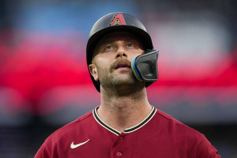 Jul 14, 2023; Toronto, Ontario, CAN; Arizona Diamondbacks first baseman Christian Walker (53) reacts after fouling out against the Toronto Blue Jays during the fourth inning at Rogers Centre. Mandatory Credit: Kevin Sousa-USA TODAY Sports