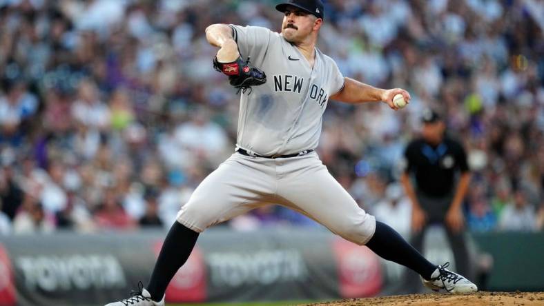 Jul 14, 2023; Denver, Colorado, USA; New York Yankees starting pitcher Carlos Rodon (55) pitches in fifth inning against the Colorado Rockies at Coors Field. Mandatory Credit: Ron Chenoy-USA TODAY Sports