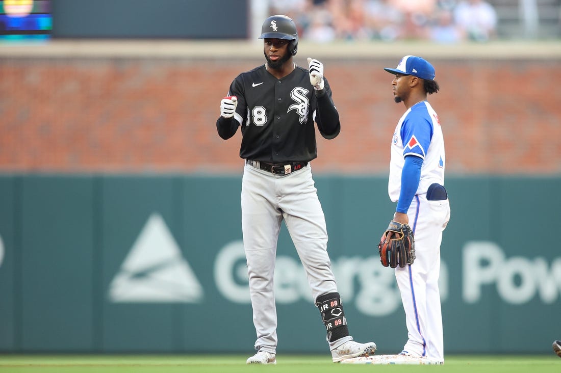 Burger hits go-ahead homer as White Sox beat Braves 6-5 for first