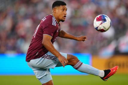 Jul 15, 2023; Commerce City, Colorado, USA; Colorado Rapids midfielder Bryan Acosta (21) controls the ball during the first half against the Houston Dynamo FC at Dick's Sporting Goods Park. Mandatory Credit: Ron Chenoy-USA TODAY Sports