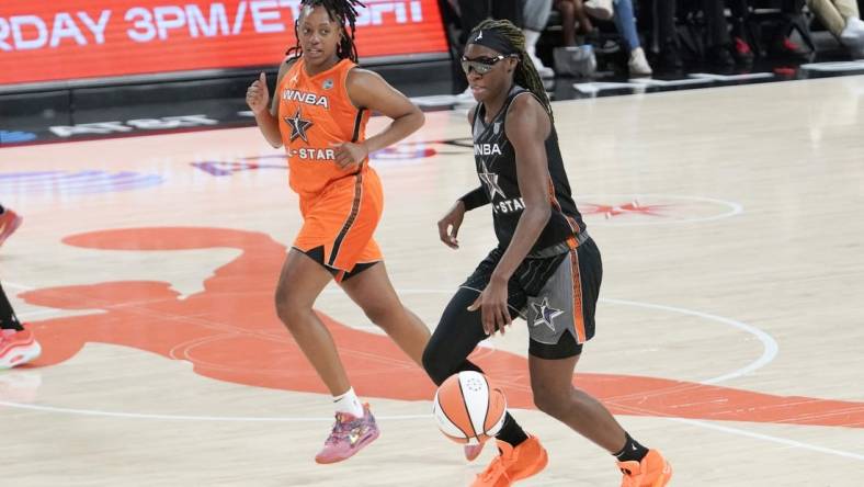 Jul 15, 2023; Las Vegas, NV, USA; Team Wilson guard Rhyne Howard (10) dribbles the ball against Team Stewart frontcourt Satou Sabally (0) during the second half in the 2023 WNBA All-Star Game at Michelob Ultra Arena. Mandatory Credit: Lucas Peltier-USA TODAY Sports