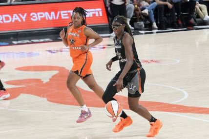 Jul 15, 2023; Las Vegas, NV, USA; Team Wilson guard Rhyne Howard (10) dribbles the ball against Team Stewart frontcourt Satou Sabally (0) during the second half in the 2023 WNBA All-Star Game at Michelob Ultra Arena. Mandatory Credit: Lucas Peltier-USA TODAY Sports
