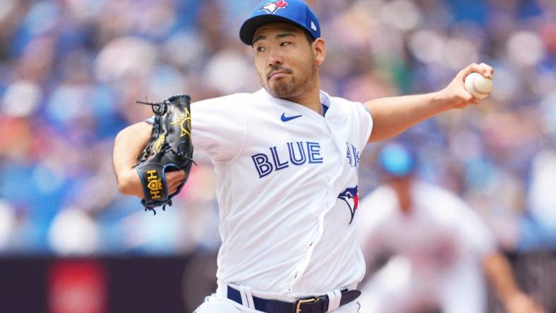 Jul 16, 2023; Toronto, Ontario, CAN; Toronto Blue Jays starting pitcher Yusei Kikuchi (16) throws pitch against the Arizona Diamondbacks during the first inning at Rogers Centre. Mandatory Credit: Nick Turchiaro-USA TODAY Sports