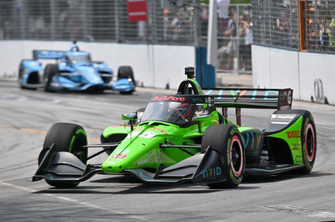 Jul 16, 2023; Toronto, Ontario, CAN;  IndyCar driver Christian Lundgaard leads Scott McLaughlin during the Honda Indy on the Streets of Toronto. Mandatory Credit: Dan Hamilton-USA TODAY Sports
