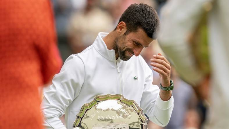 Jul 16, 2023; London, United Kingdom; Novak Djokovic (SRB) at the trophy presentation after losing the men   s singles final against Carlos Alcaraz (ESP)on day 14 at  the All England Lawn Tennis and Croquet Club. Mandatory Credit: Susan Mullane-USA TODAY Sports