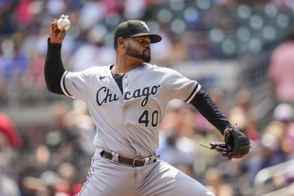 Jul 16, 2023; Cumberland, Georgia, USA; Chicago White Sox relief pitcher Reynaldo Lopez (40) pitches against the Atlanta Braves during the seventh inning at Truist Park. Mandatory Credit: Dale Zanine-USA TODAY Sports