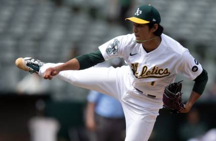 Jul 16, 2023; Oakland, California, USA; Oakland Athletics pitcher Shintaro Fujinami (11) delivers a pitch against the Minnesota Twins during the eighth inning at Oakland-Alameda County Coliseum. Mandatory Credit: D. Ross Cameron-USA TODAY Sports