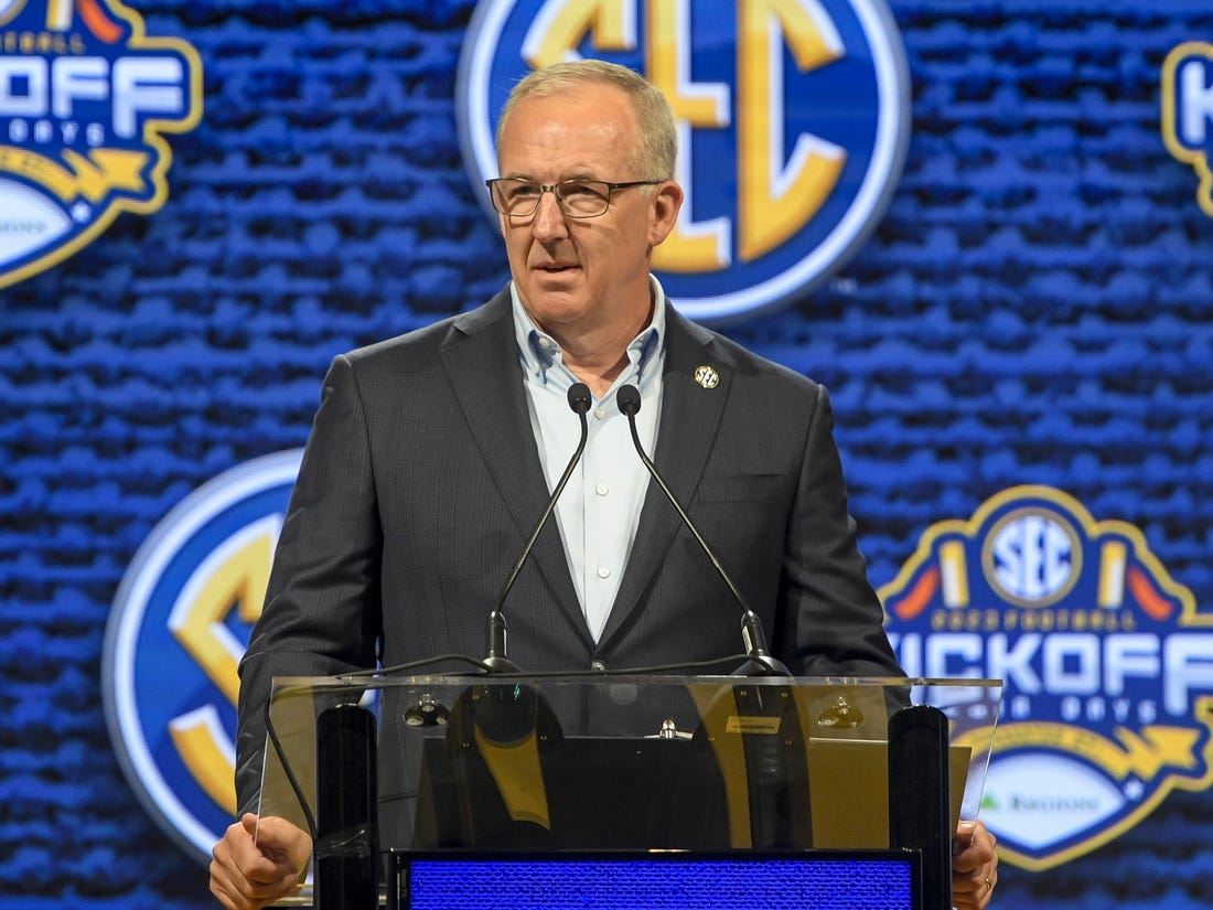 Jul 17, 2023; Nashville, TN, USA; SEC commissioner Greg Sankey  talks with the media during SEC Media Days at Grand Hyatt. Mandatory Credit: Steve Roberts-USA TODAY Sports