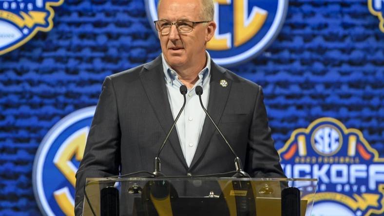 Jul 17, 2023; Nashville, TN, USA; SEC commissioner Greg Sankey  talks with the media during SEC Media Days at Grand Hyatt. Mandatory Credit: Steve Roberts-USA TODAY Sports