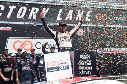 Jul 17, 2023; Loudon, New Hampshire, USA; NASCAR Cup Series driver Martin Truex Jr. (19) celebrates winning the Crayon 301 at New Hampshire Motor Speedway. Mandatory Credit: Eric Canha-USA TODAY Sports