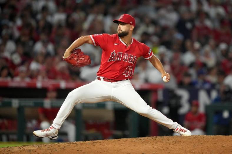 ANAHEIM, CA - JULY 18: New York Yankees pitcher Domingo German (0) pitching  during an MLB baseball game against the Los Angeles Angels played on July  18, 2023 at Angel Stadium in