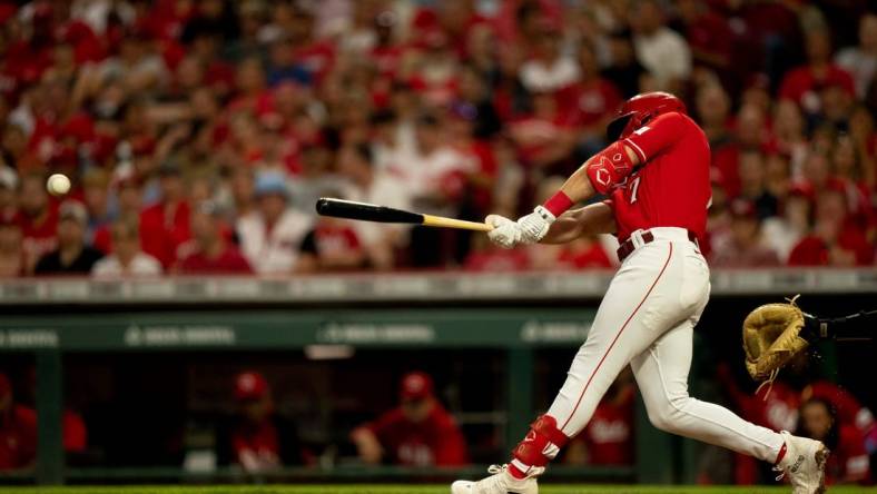 Cincinnati Reds first baseman Spencer Steer (7) hits a base hit in the second inning of the MLB baseball game between the Cincinnati Reds and San Francisco Giants at Great American Ball Park in Cincinnati on Tuesday, July 18, 2023.