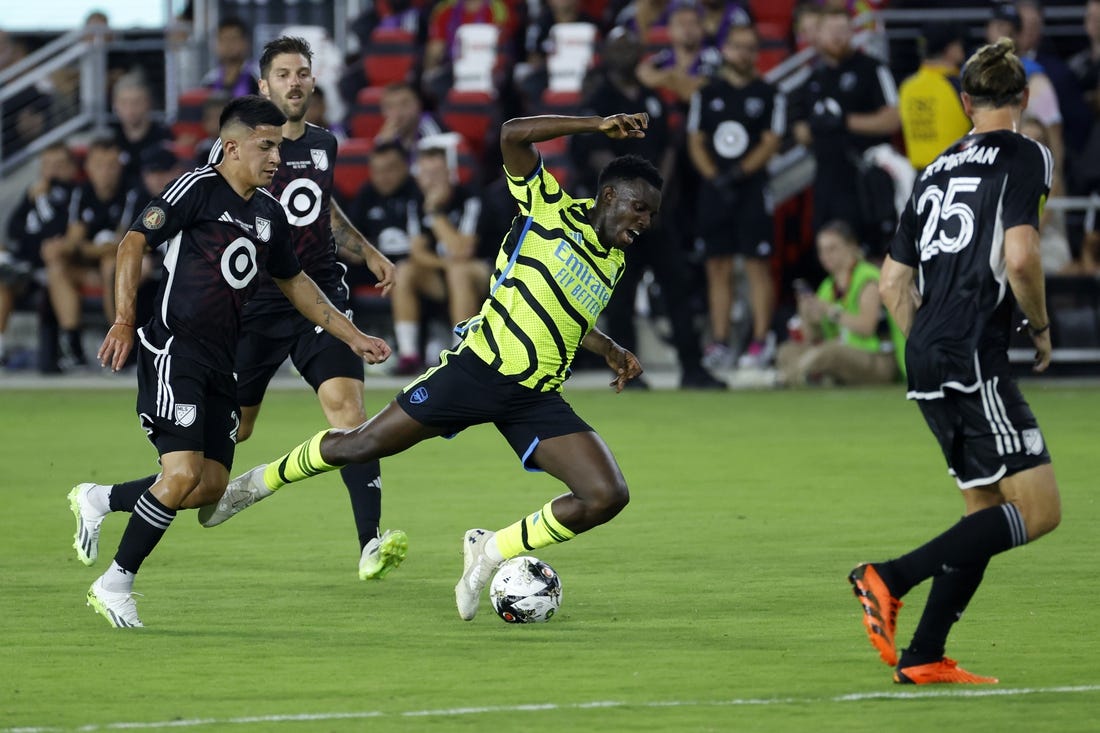 Jul 19, 2023; Washington, DC, USA; MLS midfielder Thiago Almada (23) of Atlanta United fouls Arsenal midfielder Bukayo Saka (7) during the first half of the 2023 MLS All Star Game at Audi Field. Mandatory Credit: Geoff Burke-USA TODAY Sports