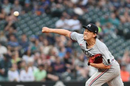 Jul 19, 2023; Seattle, Washington, USA; Minnesota Twins starting pitcher Kenta Maeda (18) pitches to the Seattle Mariners during the seventh inning at T-Mobile Park. Mandatory Credit: Steven Bisig-USA TODAY Sports